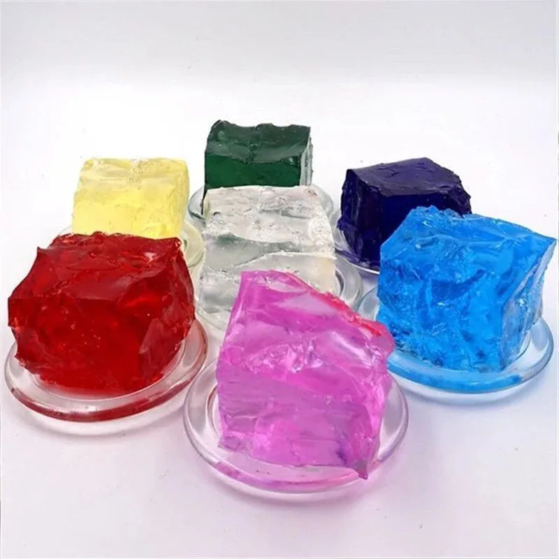 Transparent jelly wax cubes in seven colours